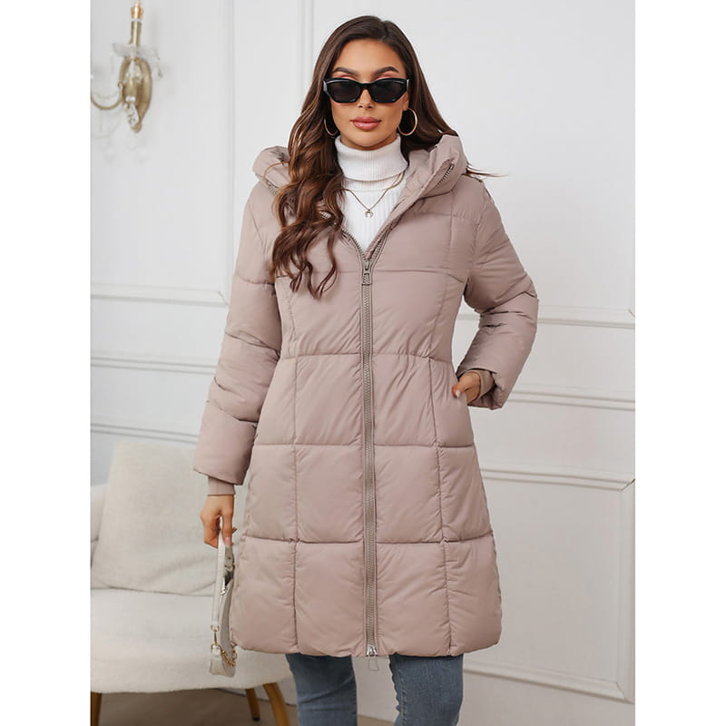A beige quilted cotton padded winter jacket for women with a hood and front zipper.