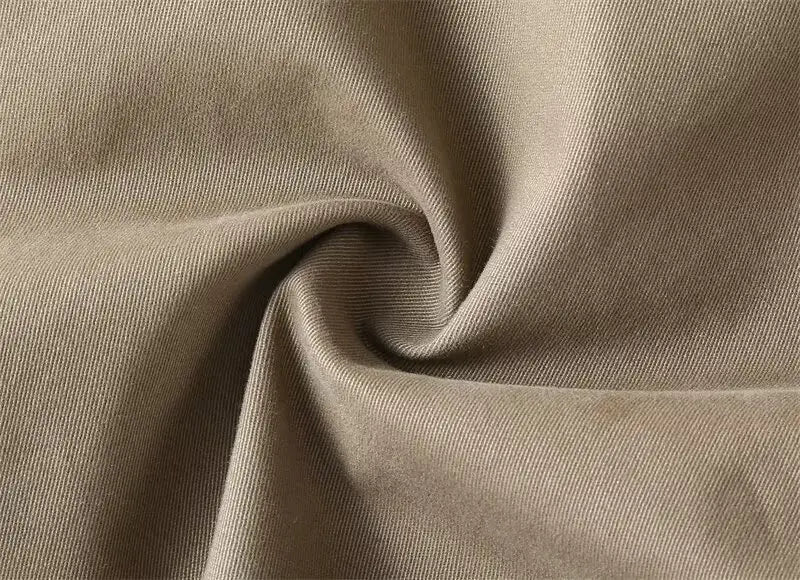 beige ribbed knit fabric with a soft textured surface used in men casual slim fit cargo shorts.