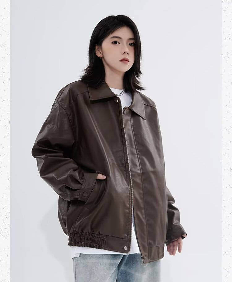 Brown faux leather bomber jacket with relaxed fit and elasticized waistband for men’s outerwear.