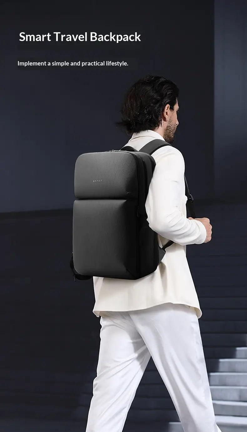 Black smart travel business commuter backpack with sleek minimalist design large capacity and subtle front branding for laptop and daily use