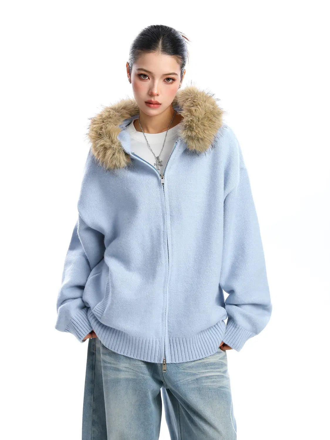 Light blue fur collar hooded knit coat featuring a zip-up front, fluffy tan fur-lined hood, and ribbed cuffs.