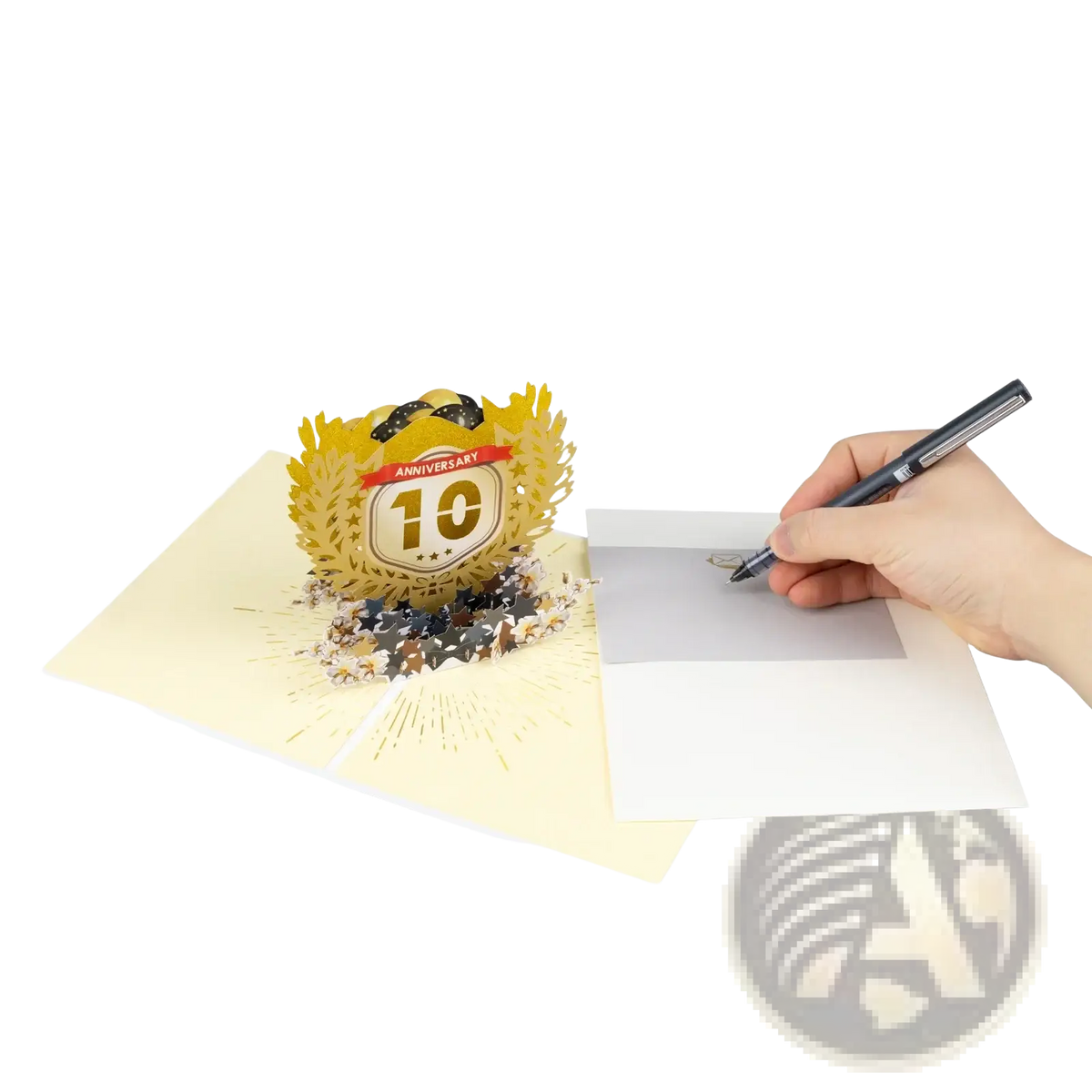 Golden 3d pop up card featuring a 10th anniversary emblem with laurel wreath and sparkling embellishments