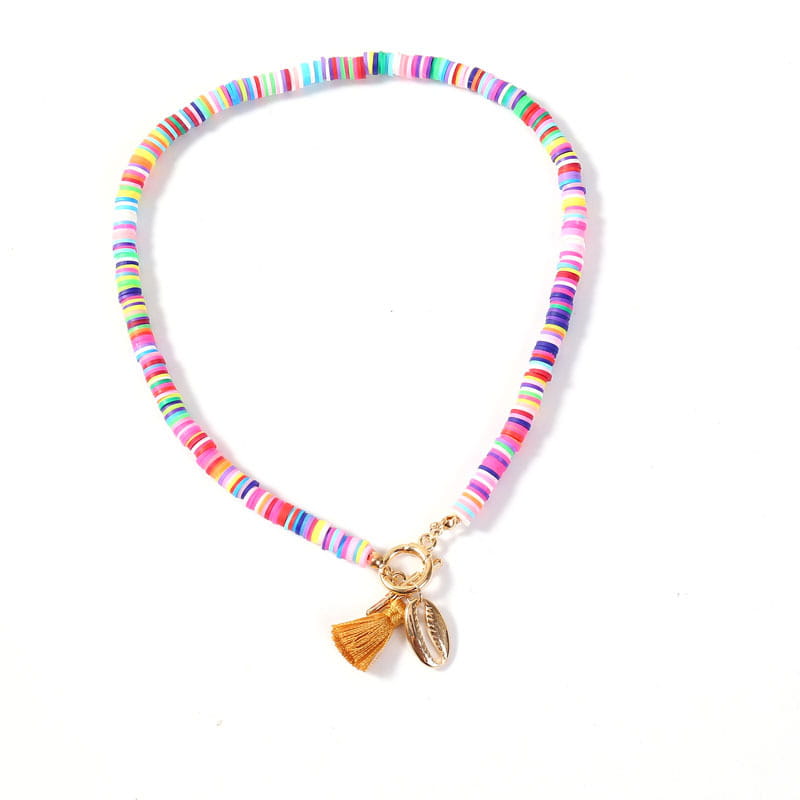 Bohemian rainbow beaded choker featuring colorful beads with a gold-toned toggle clasp and small tassel charm.