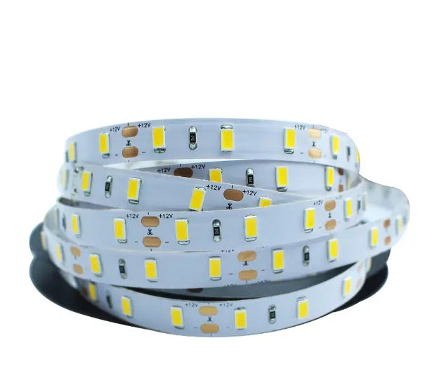 white led strip lights 5m with evenly spaced yellowish leds and silver circuitry for waterproof flexible home decor use
