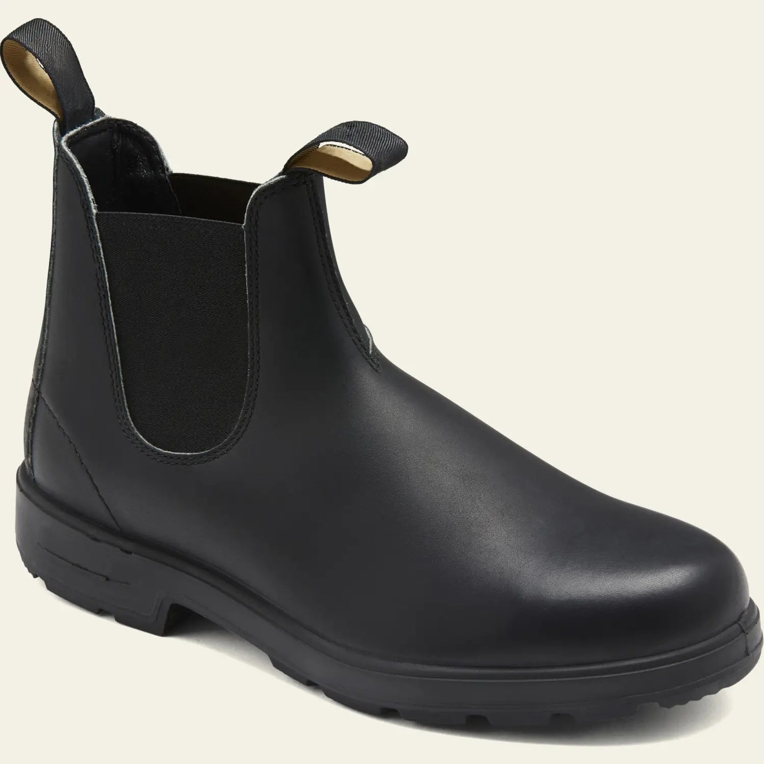 Black leather unisex vintage chelsea boot with elastic side gussets and a pull tab at the back shown from the rear.