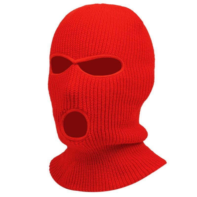 Bonnet cagoule tricoté rouge vif, avec des ouvertures pour les yeux et la bouche, conçu comme un masque chaud pour le cyclisme.