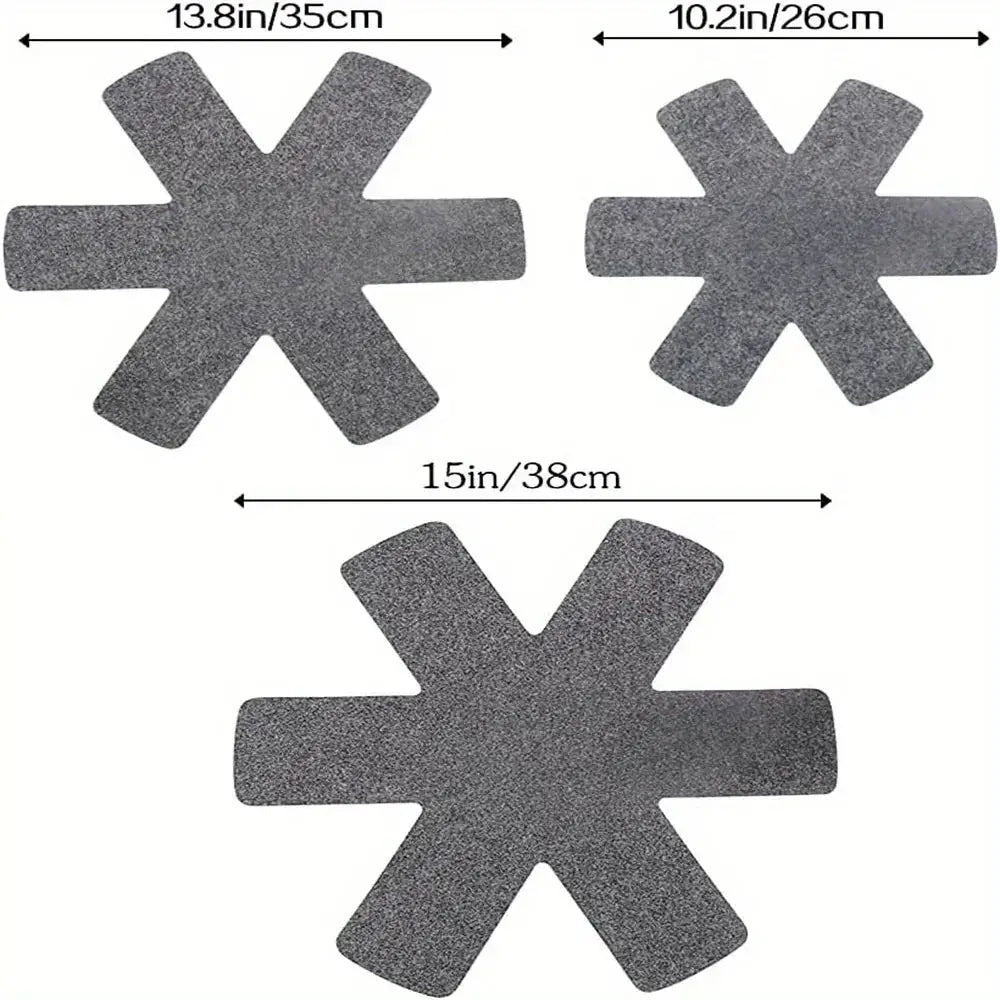 Gray star-shaped adhesive felt foot pads in three sizes for 12 piece multi size pot and pan stacking protectors