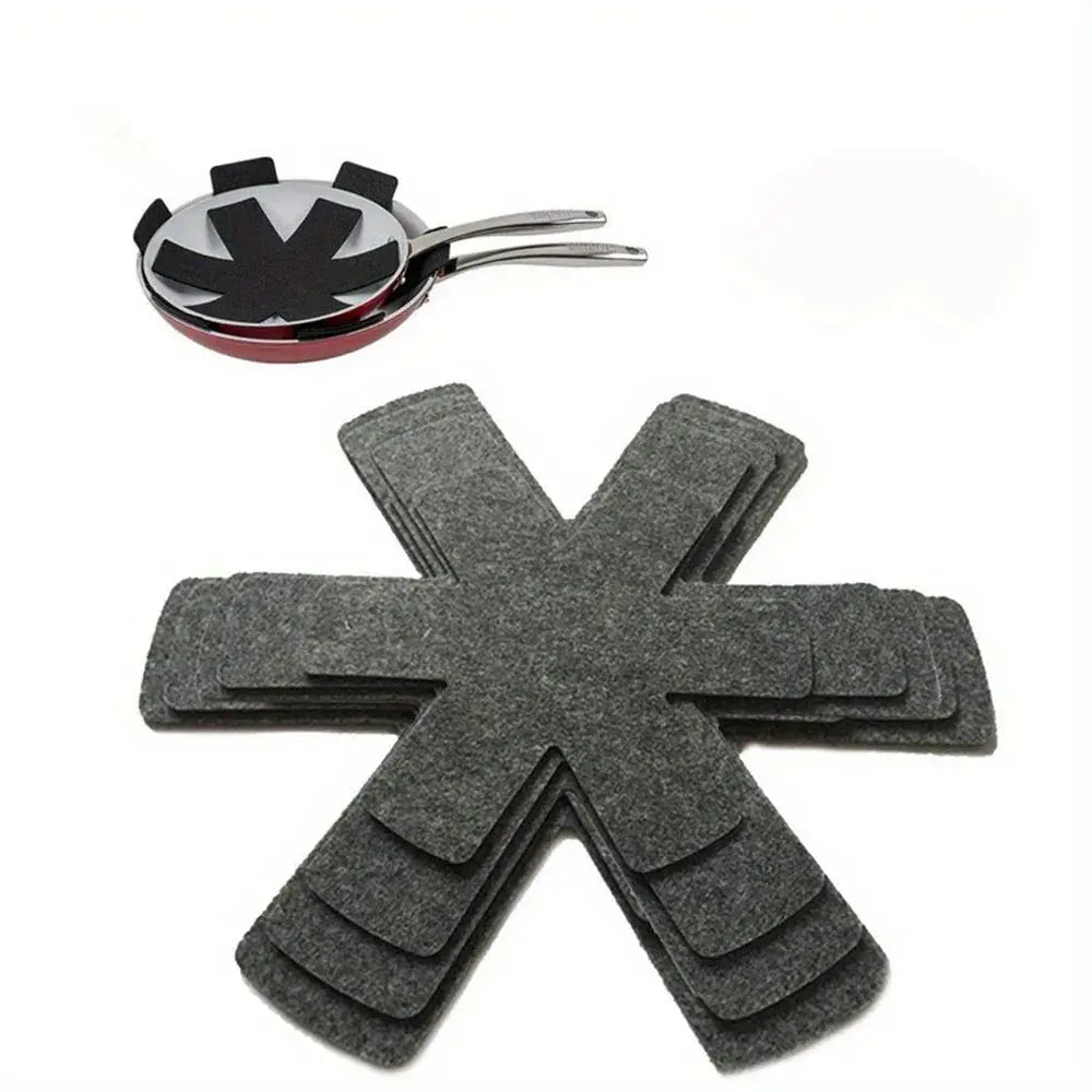 Gray felt star-shaped pan protector from a 12 piece multi size felt pot and pan protectors set for stacking