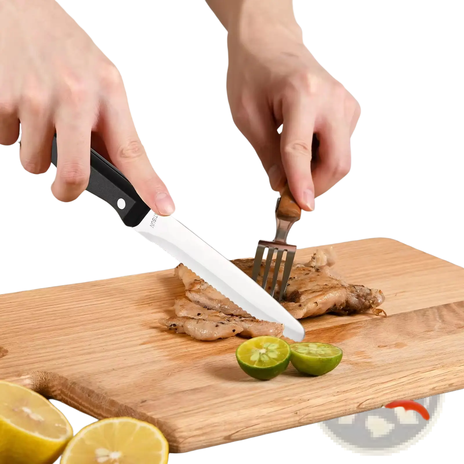 Black-handled serrated carbon steel steak knife slicing grilled meat on wooden board from 12 piece kitchen set with ABS handles