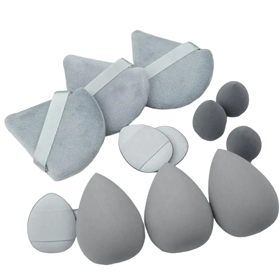 Set of 12 gray silicone and sponge makeup sponges in teardrop and half-moon shapes with light elastic bands
