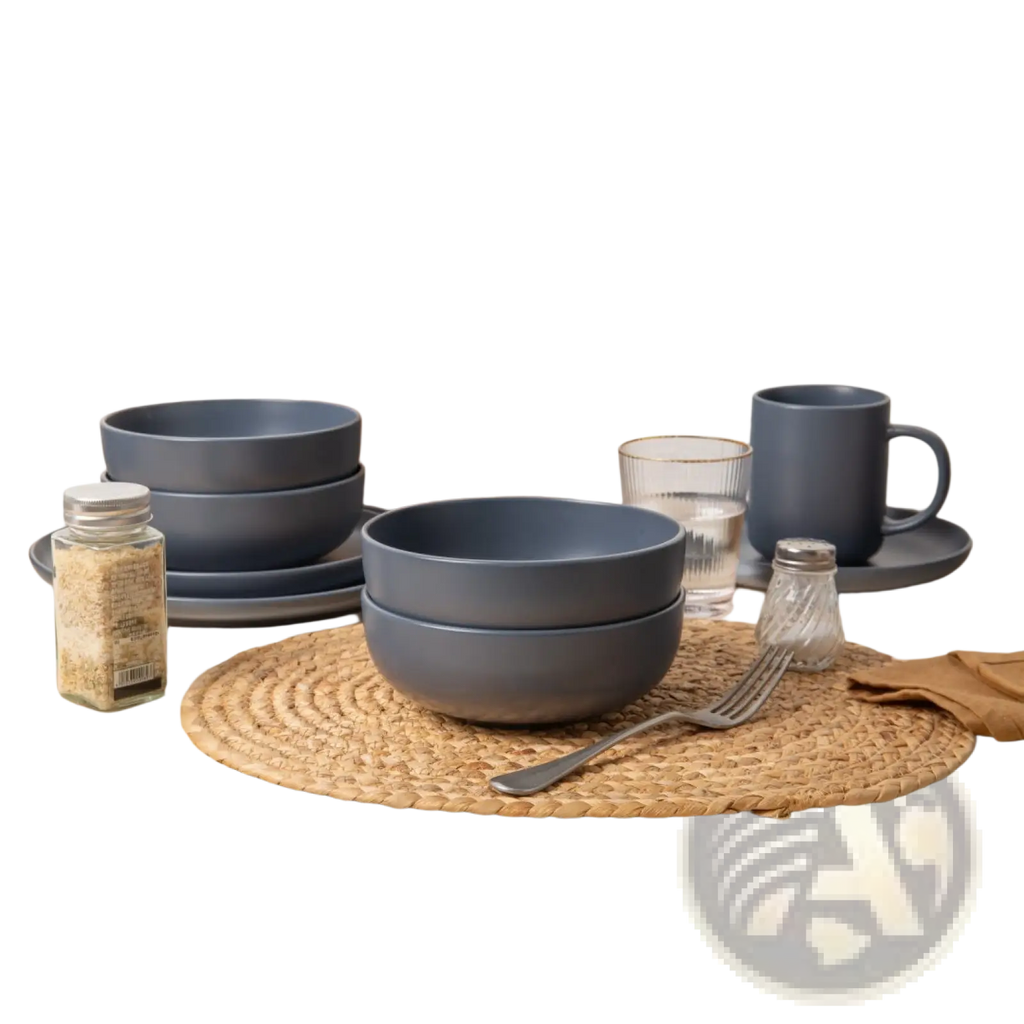Set of matte gray stoneware ceramic bowls with rounded rims in a 12-piece matte glaze dinnerware set for three