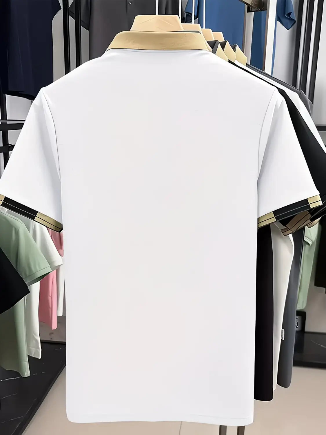 Mens slim fit striped polo shirt featuring a white short-sleeved design with a beige collar and black and gold striped trim on the sleeves.