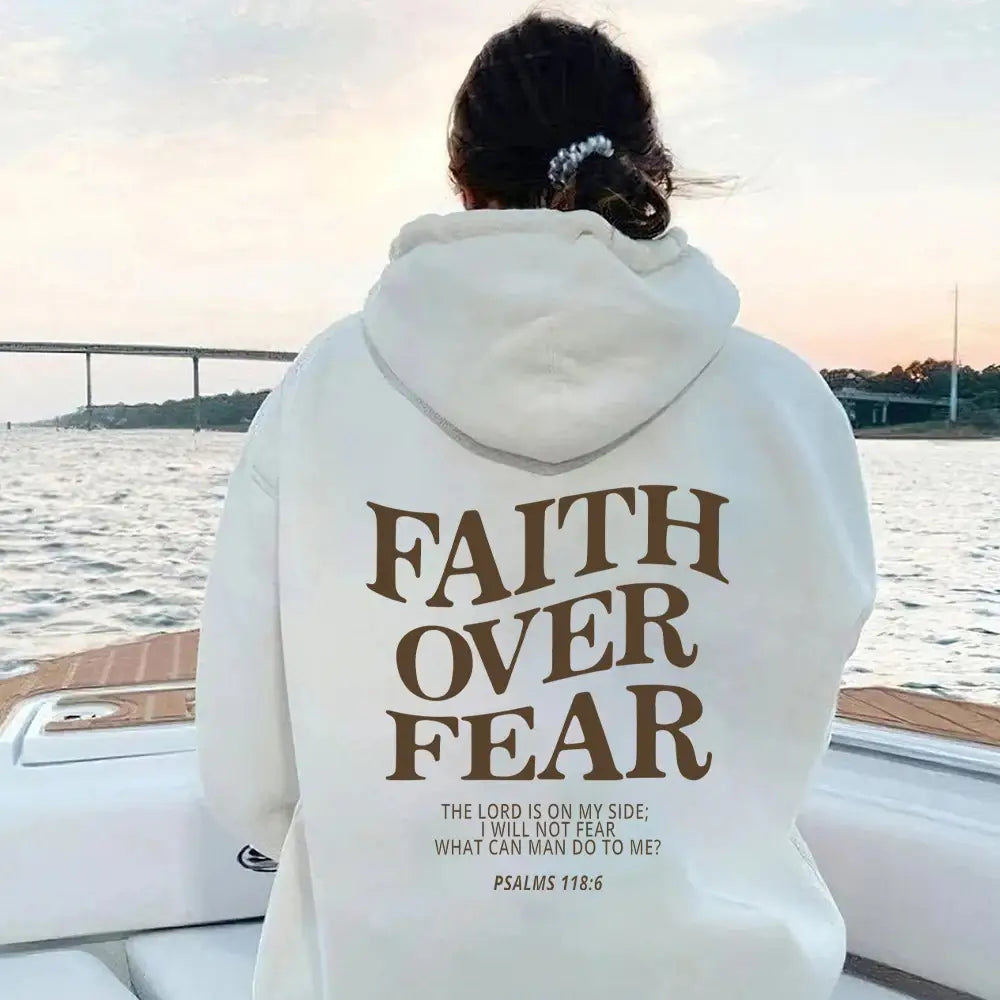 White hoodie with faith over fear printed in brown featuring a hood and long sleeves from the faith over fear psalm 118 6 christian aesthetic hoodie collection.