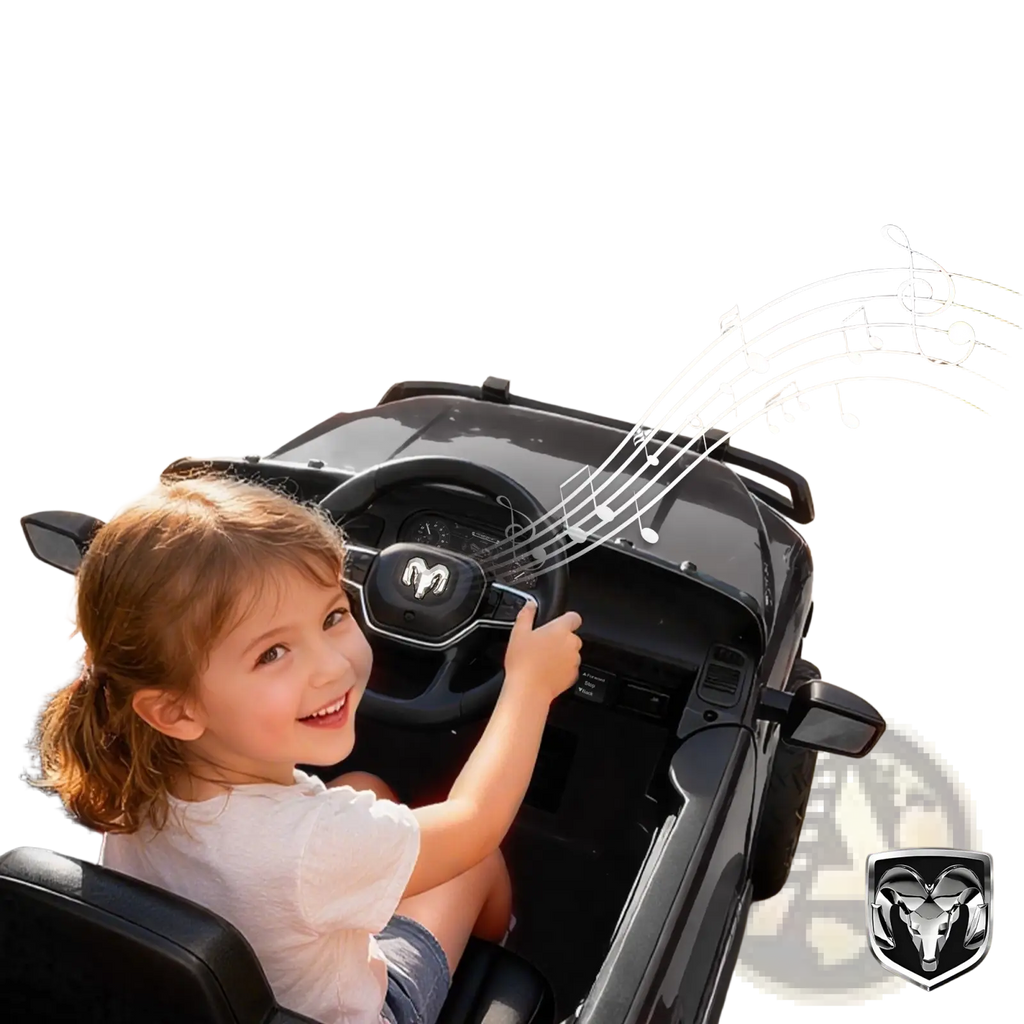 Black 12v Dodge Ram 3500 kids ride on car with Ram logo on steering wheel and dashboard for electric driving