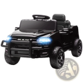 Black 12v dodge ram 3500 kids ride on car with illuminated headlights and rugged tires shown from the back side