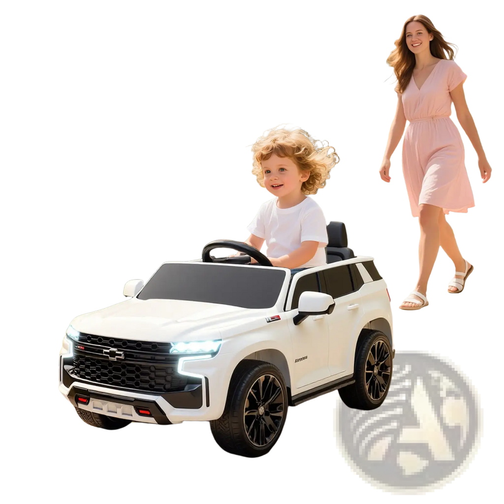 White 12v kids electric ride on Chevrolet toy suv with black accents and chrome detailing designed like a suburban