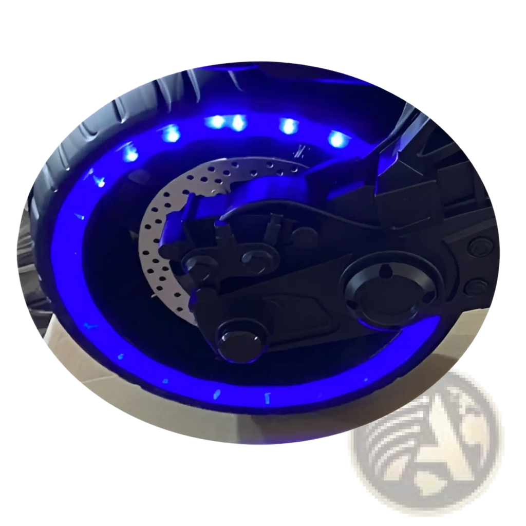 Blue led-lit circular motorcycle wheel with black brake disc and metallic parts on 12v kids ride on yamaha r3 toy bike back side