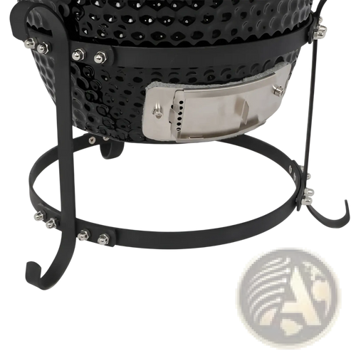 Black ceramic 13 inch kamado charcoal grill with textured dimpled surface and stainless steel access panel