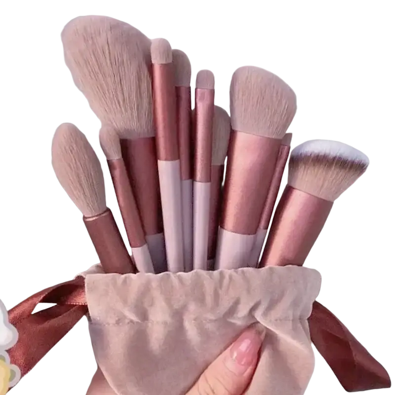 13 pcs makeup brushes set with rose gold handles and soft bristles in a white velvet pouch for eye shadow and cosmetic use