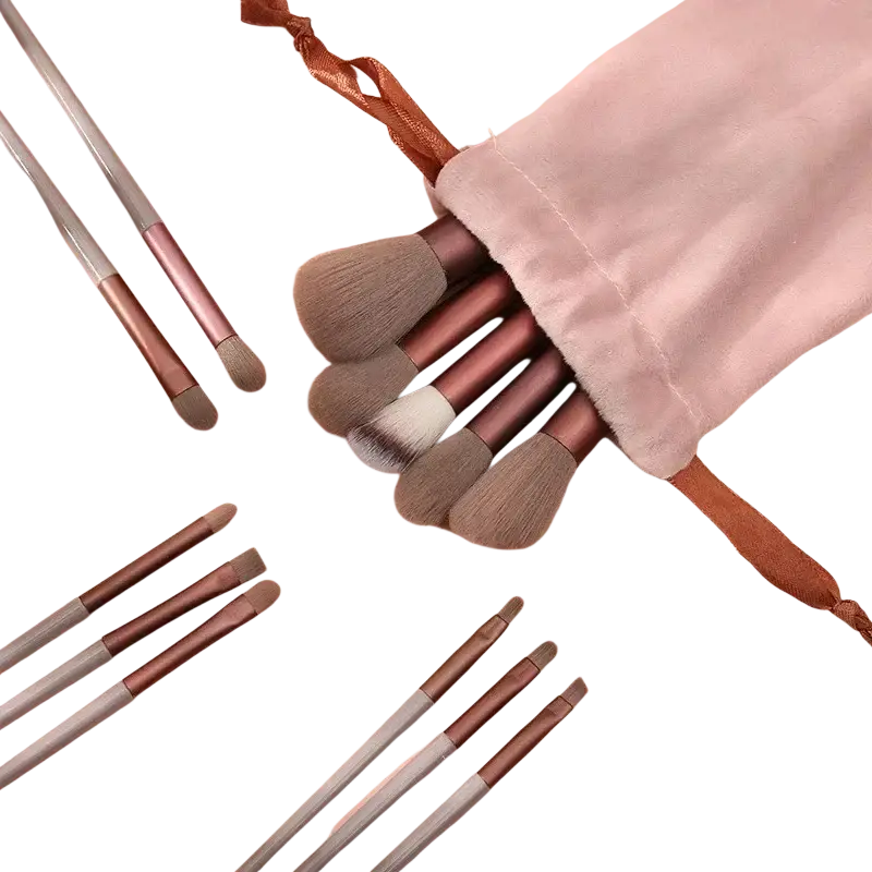 A 13 pcs makeup brushes set with rose gold and silver handles featuring soft bristles for eye shadow in a blush pink pouch