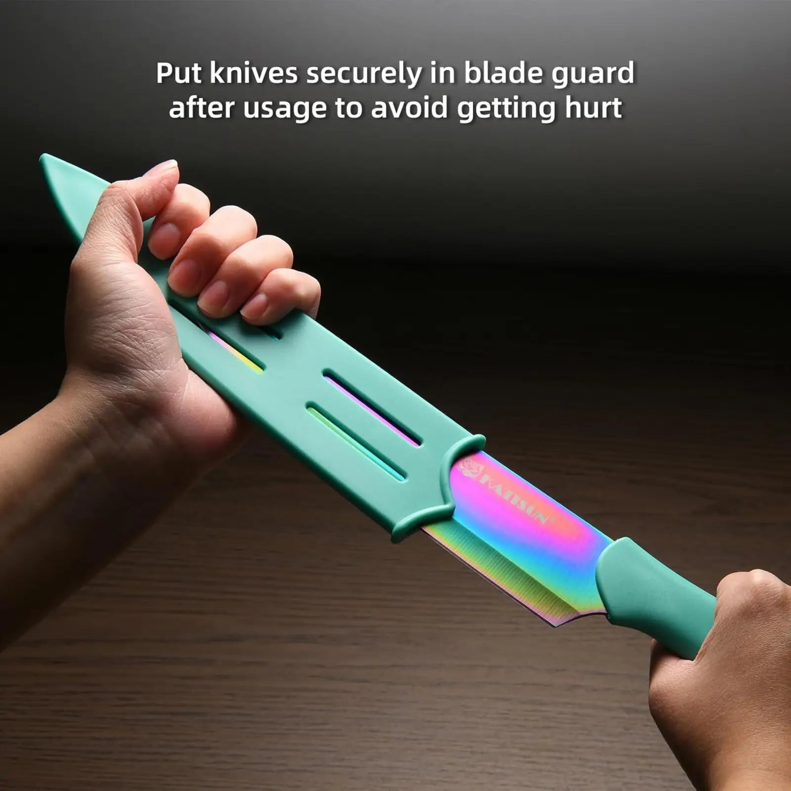 Teal knife with rainbow iridescent stainless steel blade and handle secured in guard from 13 piece blue knife set