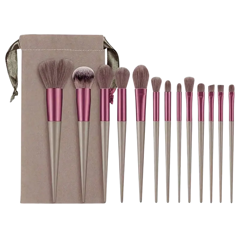 Set of 12 professional makeup brushes with rose gold and silver handles and soft bristles in taupe velvet pouch