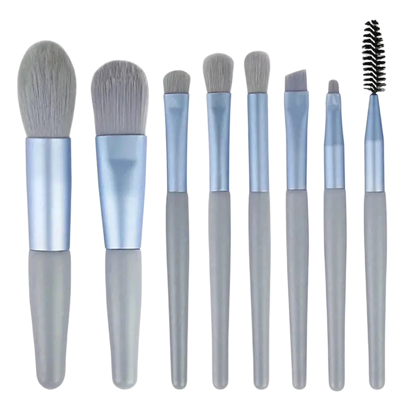 Set of eight sleek light blue and gray makeup brushes with soft bristles in a professional 13 piece makeup brush set