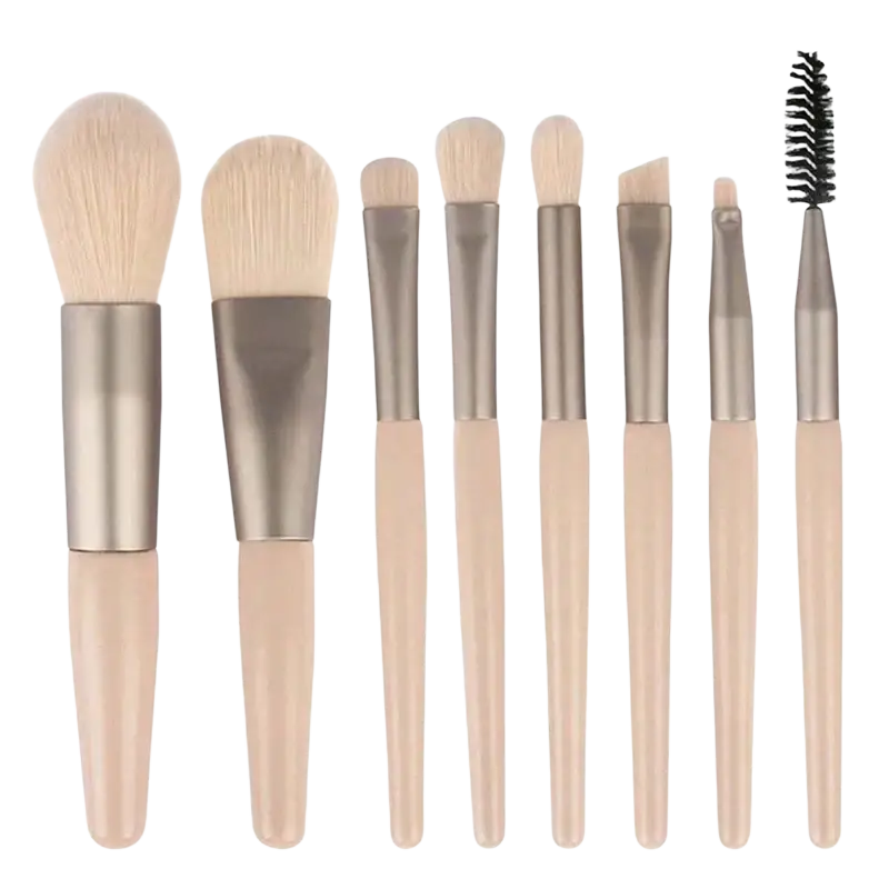 Set of seven beige handled professional makeup brushes with silver ferrules and soft light bristles for versatile use