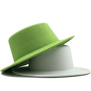 A lime green wool fedora hat with a wide brim, soft slightly curved crown, and leather belt detail.