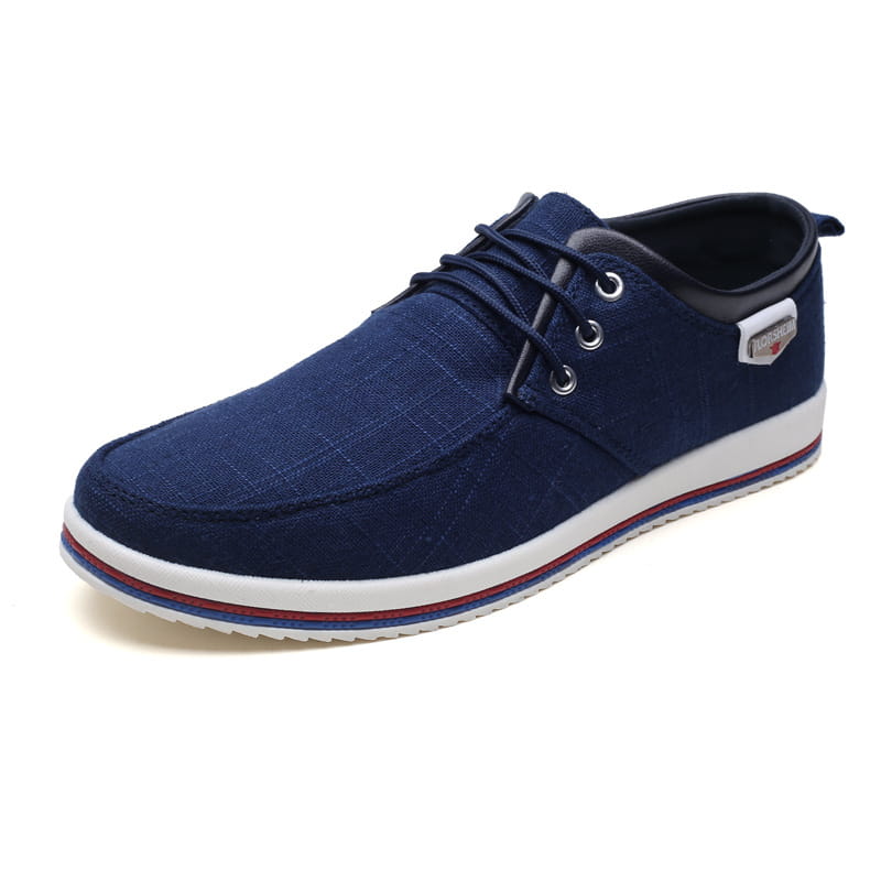 Dunkelblaue Leinensneaker für Herren mit Schnürdesign und weiß-rot gestreifter Sohle, ideal für den lässigen Alltag in Übergrößen.