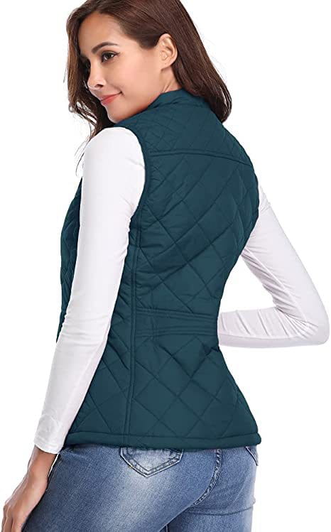 Chaleco acolchado tipo puffer de algodón color turquesa para mujer con cuello alto y detalles de bolsillo en la costura lateral.
