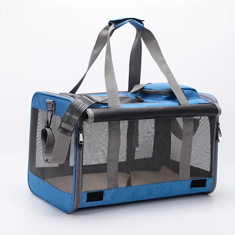 Blue and gray breathable Oxford pet carrier shoulder bag with mesh sides, sturdy fabric handles, and a zippered top.