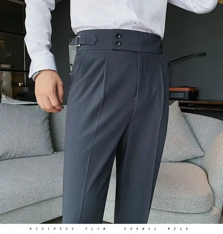 Dark gray slim-fit formal trousers with a high waist double-button closure and belt loops in Korean style slim fit men trousers.