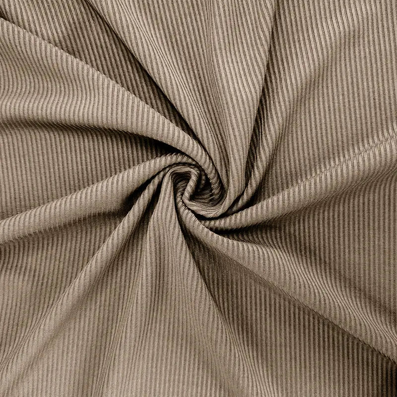 Beige corduroy fabric with distinct vertical ribs on a women’s ruffled ribbed knit slim fit mock neck top.