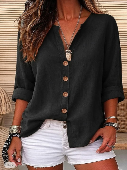 black short sleeve button up cardigan for women featuring a v-neckline and rolled sleeves in a button-down blouse style