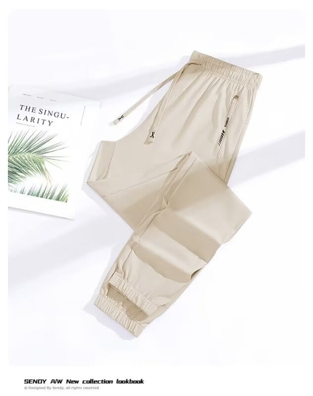 beige anti-mosquito casual athletic cargo pants with elastic waistband and drawstring featuring side pockets and subtle branding on the leg
