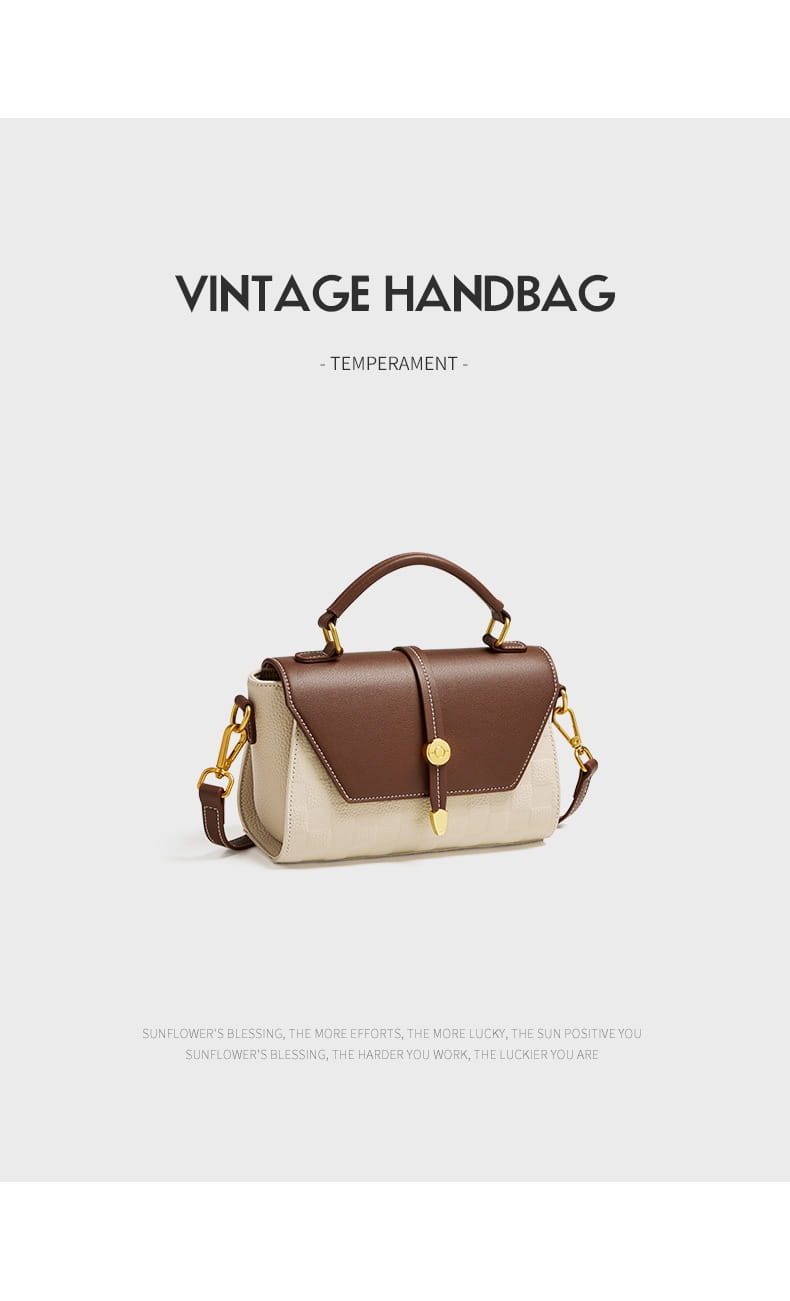 Braune und cremefarbene zweifarbige Vintage-Webleder-Crossbody-Handtasche mit goldtönigen Beschlägen.