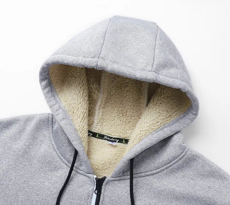 Herren-Schwergewicht-Sherpa-Fleecepullover mit Reißverschluss, innen mit Sherpa gefüttert, in grau mit schwarzen Kordeln und von vorne sichtbar ausgekleidetem Fleece.