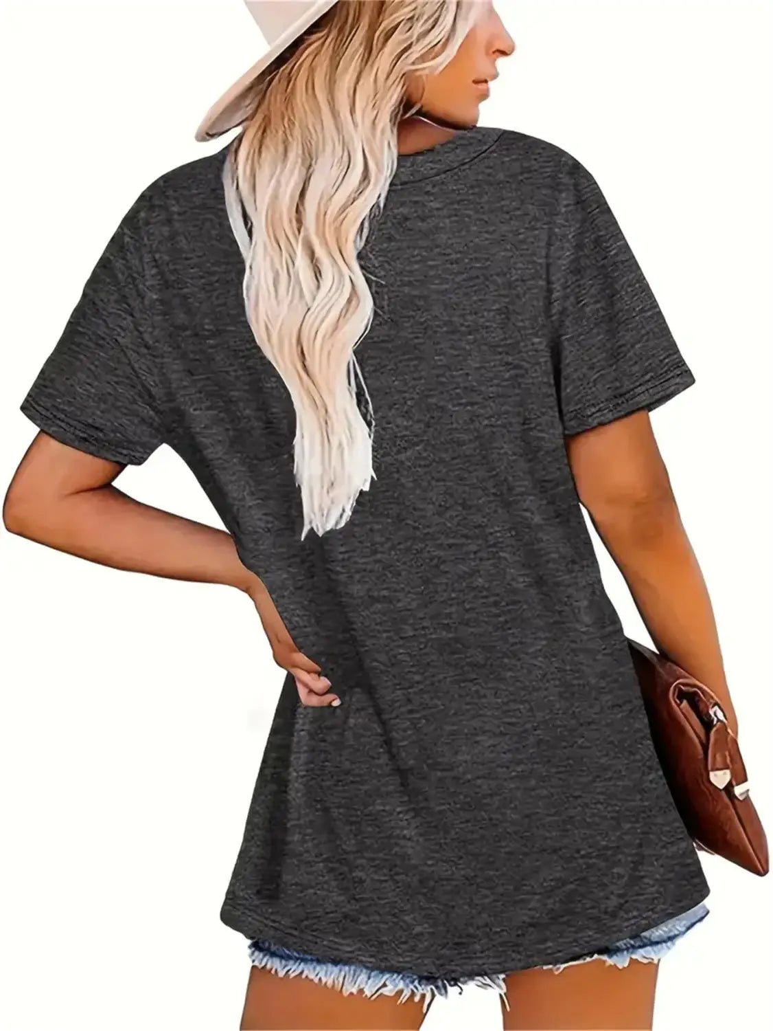 Women’s relaxed fit korean minimalist cotton t-shirt in dark gray heathered fabric with a frayed hem.