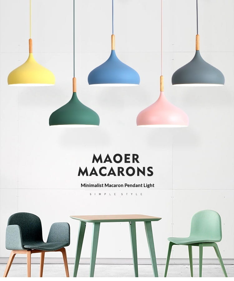 Nordic macaron led pendant lights with pastel colors and wood accents hang above a minimalist dining set.