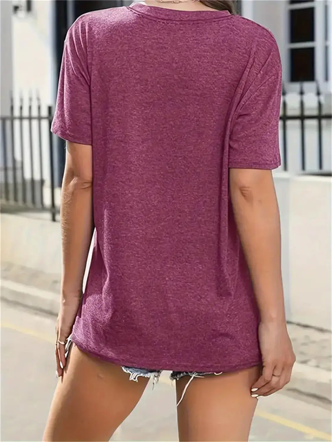 A soft heathered maroon short-sleeved relaxed fit cotton t-shirt designed for women with a minimalist Korean style.