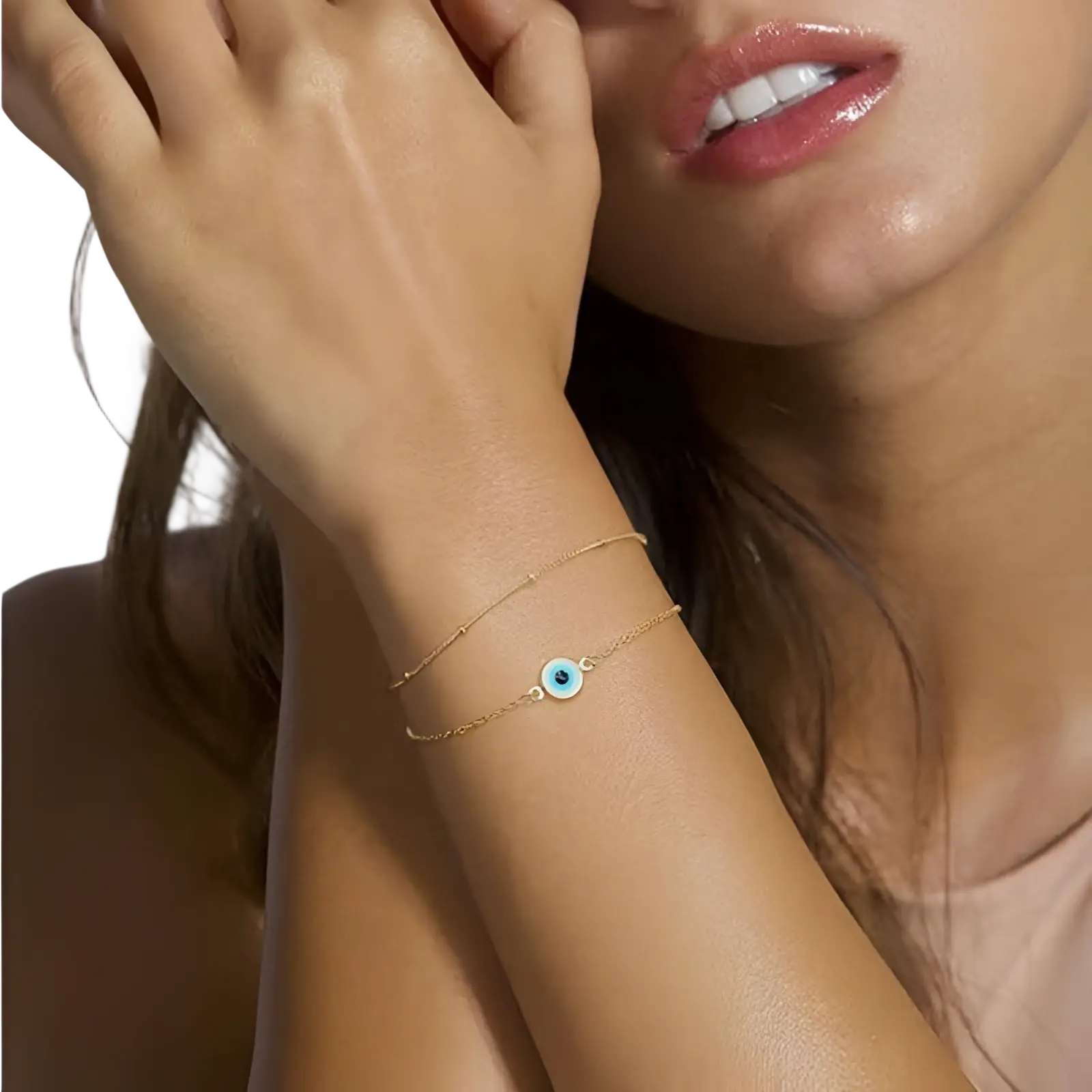 Delicate 14k gold filled layered bracelet featuring a small round blue evil eye charm with adjustable design