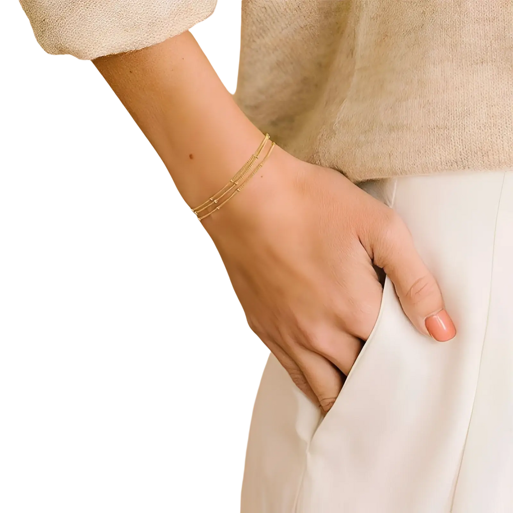14k gold filled triple layer beaded chain bracelet with three delicate gold-toned interwoven chains and subtle beads