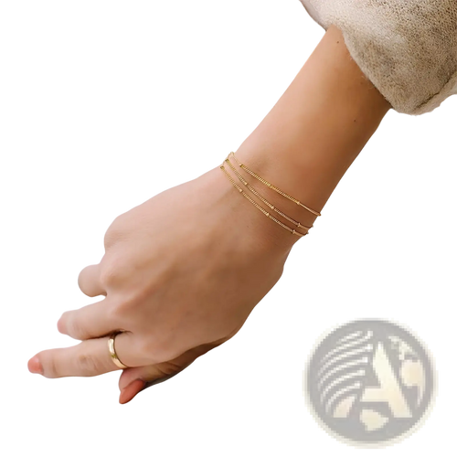 Delicate 14k gold filled triple layer beaded chain bracelet in gold tone with fine detailing