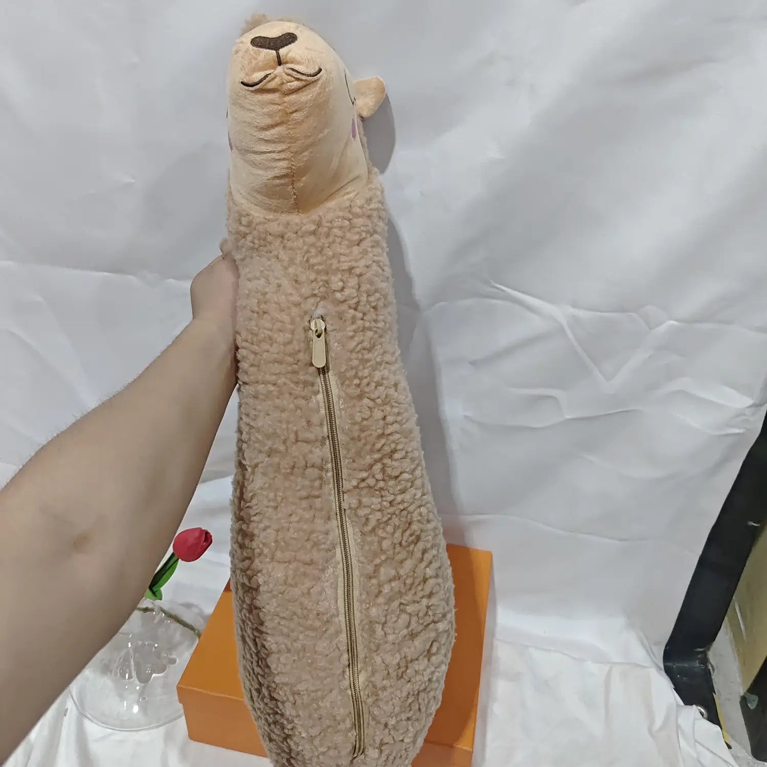 beige plush sheep-shaped bag with zipper closure made of soft textured fur material resembling a large white alpaca plush toy pillow 75cm.