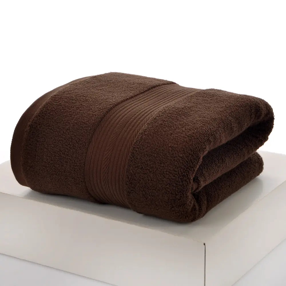 A plush deep brown coral fleece bathrobe set featuring a ribbed texture and soft terry cloth finish.