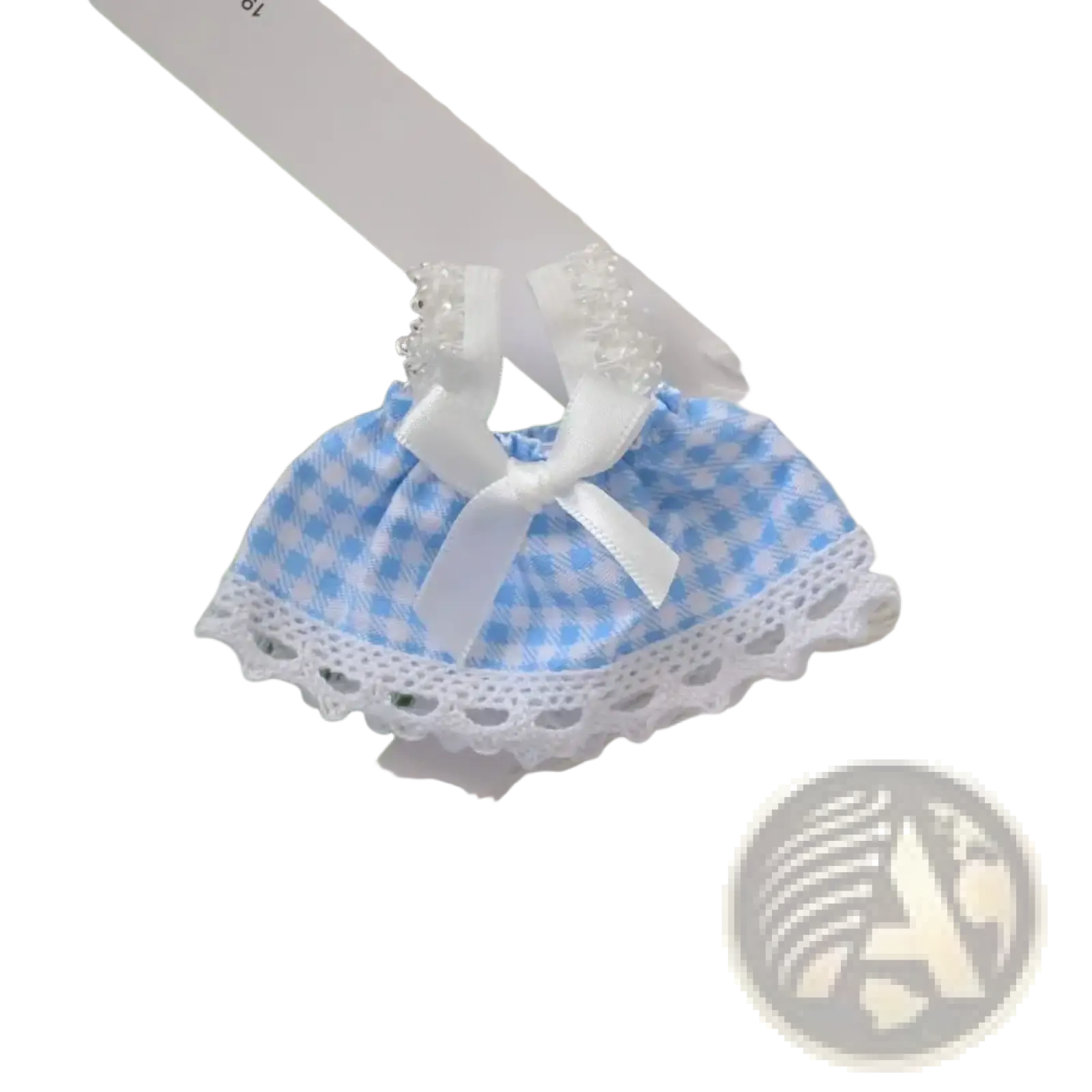 A delicate blue and white gingham 15cm doll mini dress with lace trim and satin ribbon bow for plush outfit