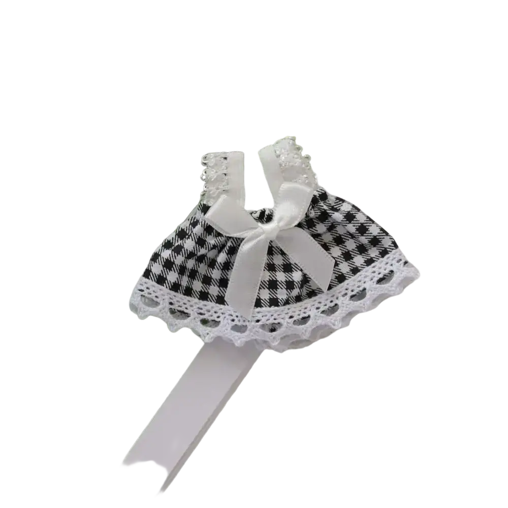 A delicate black and white checkered 15cm doll gingham dress with lace trim and a satin bow plush outfit