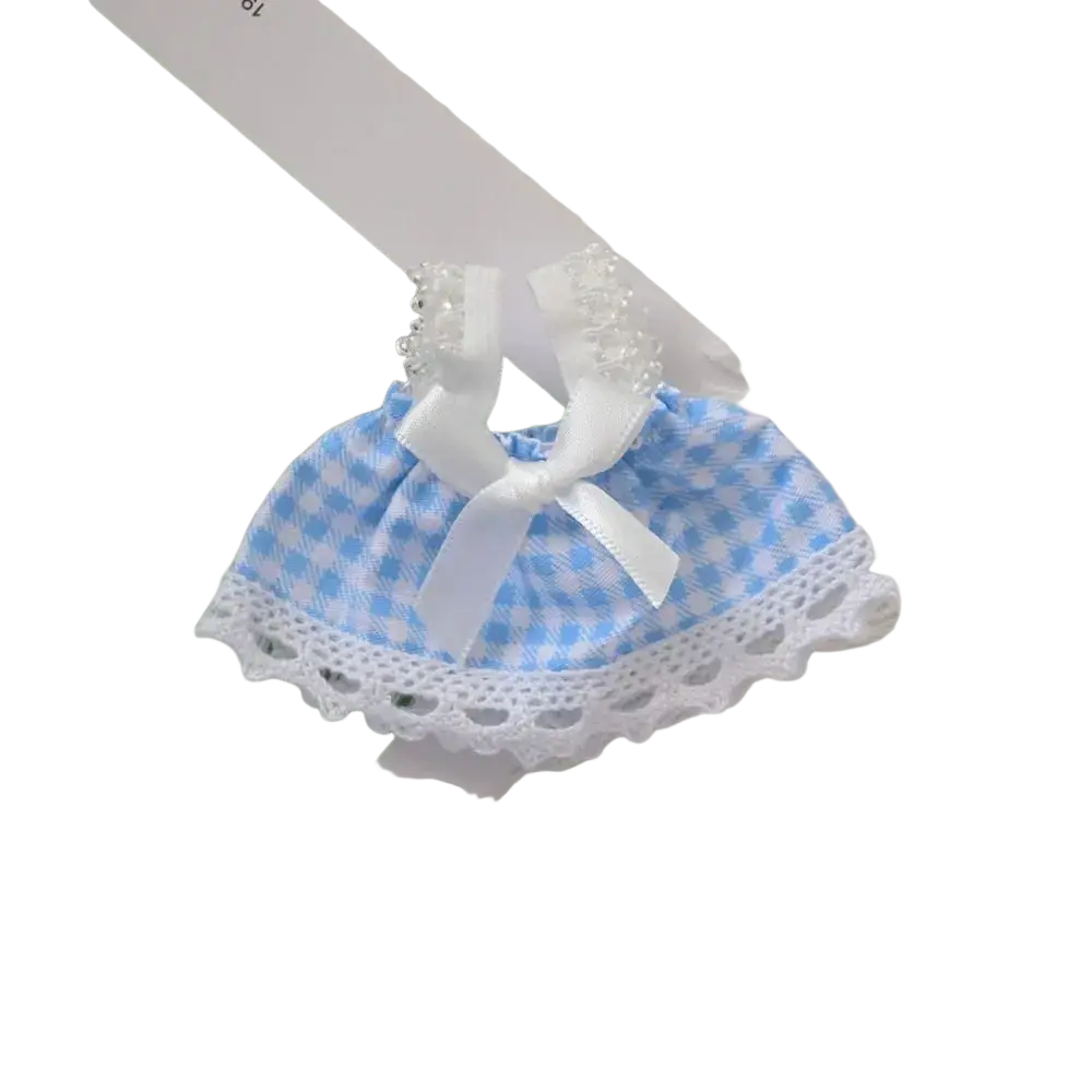 A delicate blue and white gingham 15cm doll mini dress with lace trim and satin ribbon bow for plush outfit