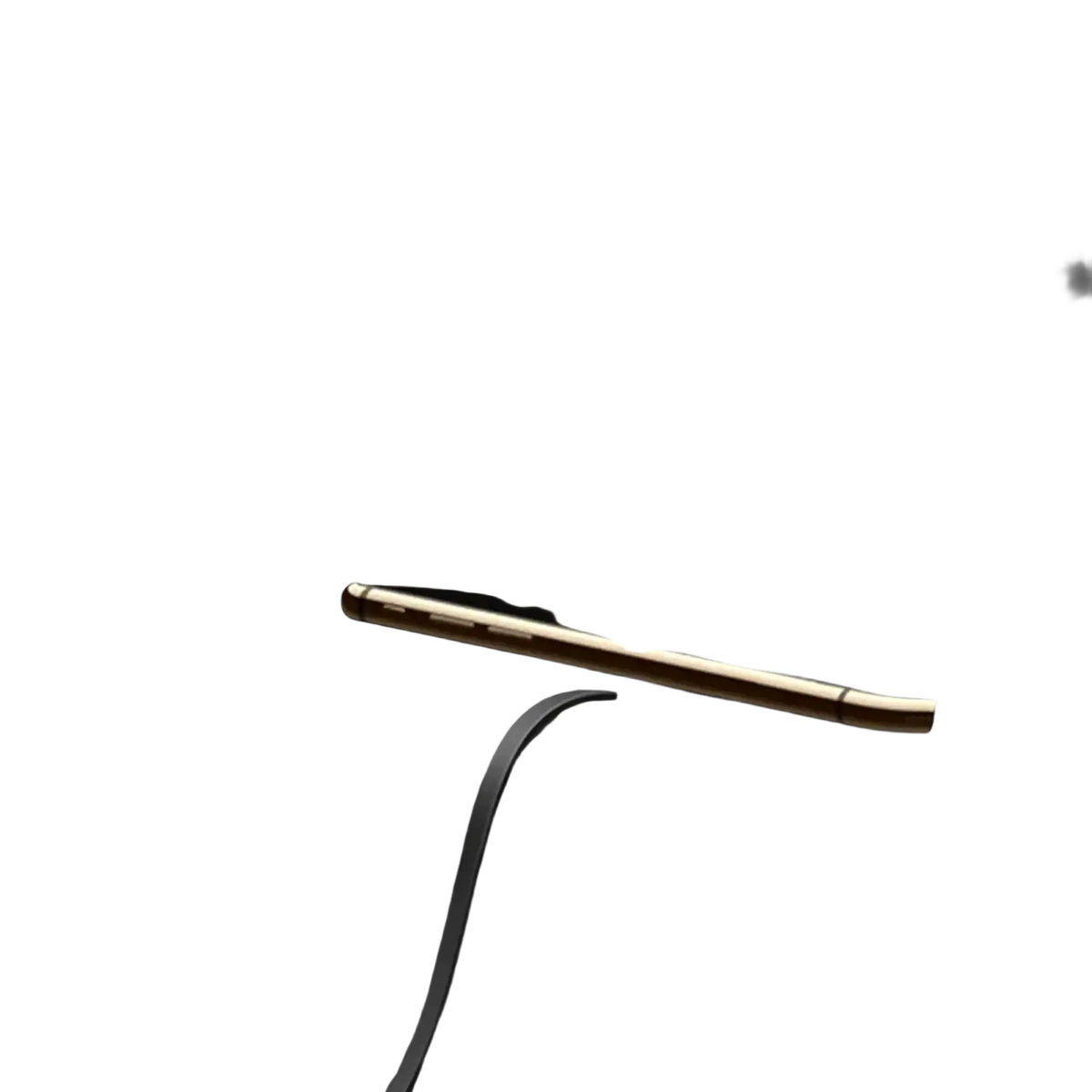 Gold-colored smartphone resting in black car center console with 15w fast wireless car charger pad for convenient charging